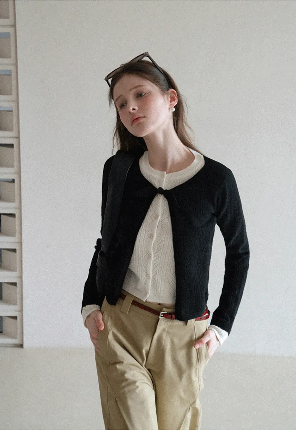 Elegant Knit Cardigan with Bow Detail and Ribbed Texture