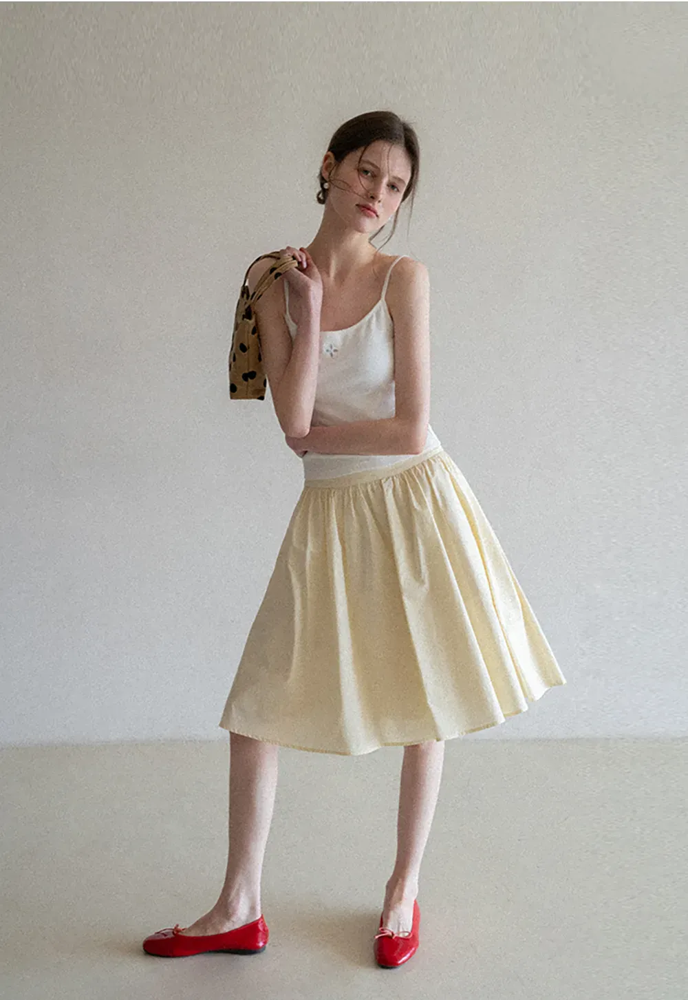 A-line pleated midi skirt with waistband