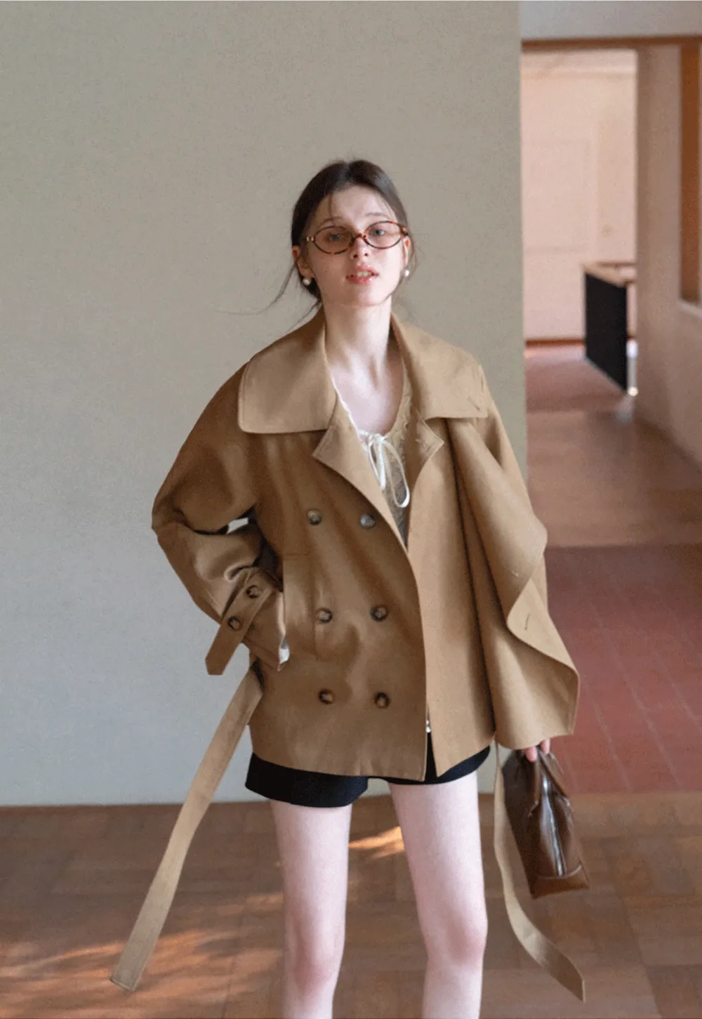 Long sleeve shirt with ruffled neckline and gathered cuffs