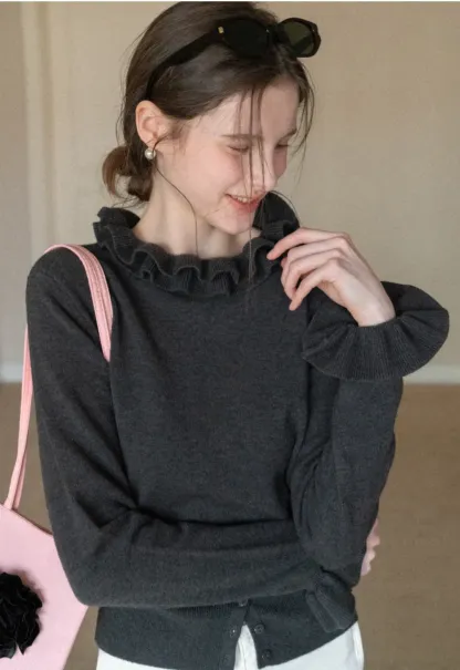 Elegant Ruffle Detail Knit Sweater with Flared Cuffs and Neckline