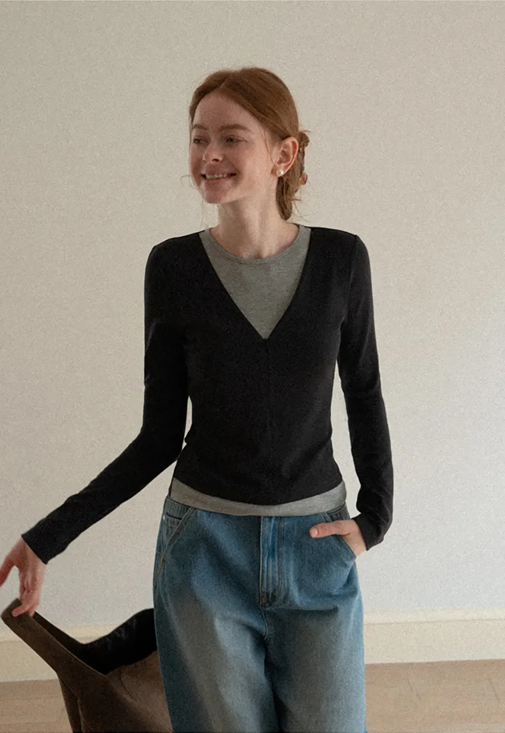 Long sleeve crop top with round neck and hem stitching design