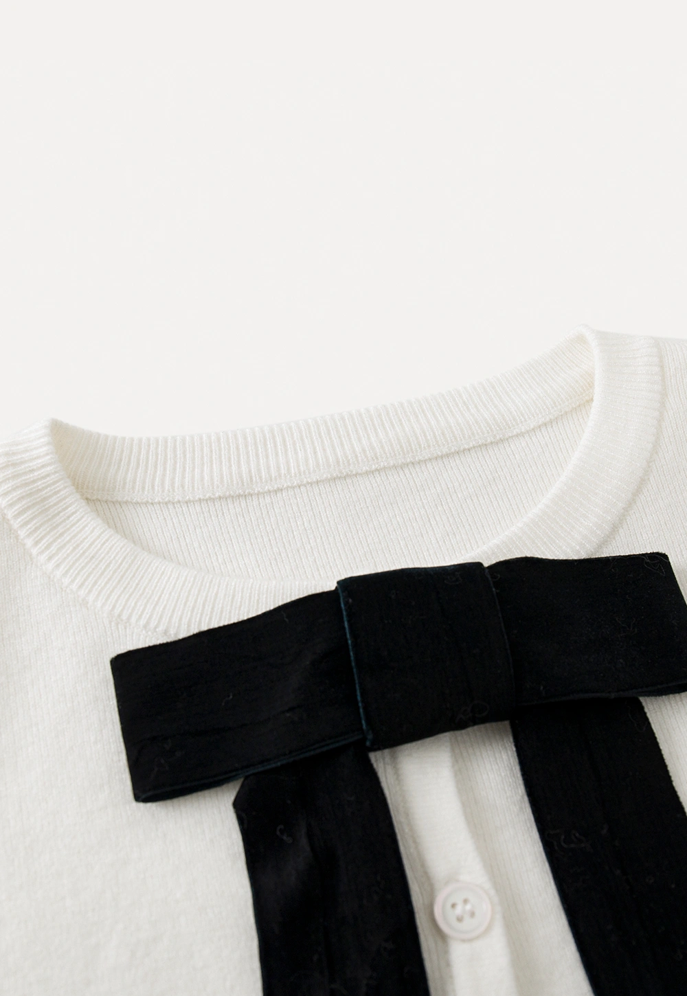 Chic White Cardigan with Bow Tie and Matching Camisole