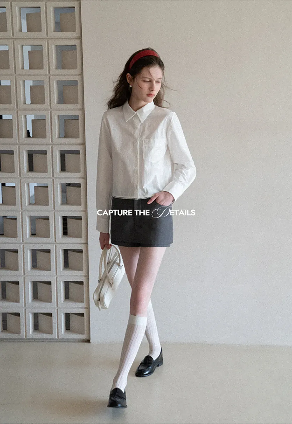 Long sleeve button front shirt with scalloped hem