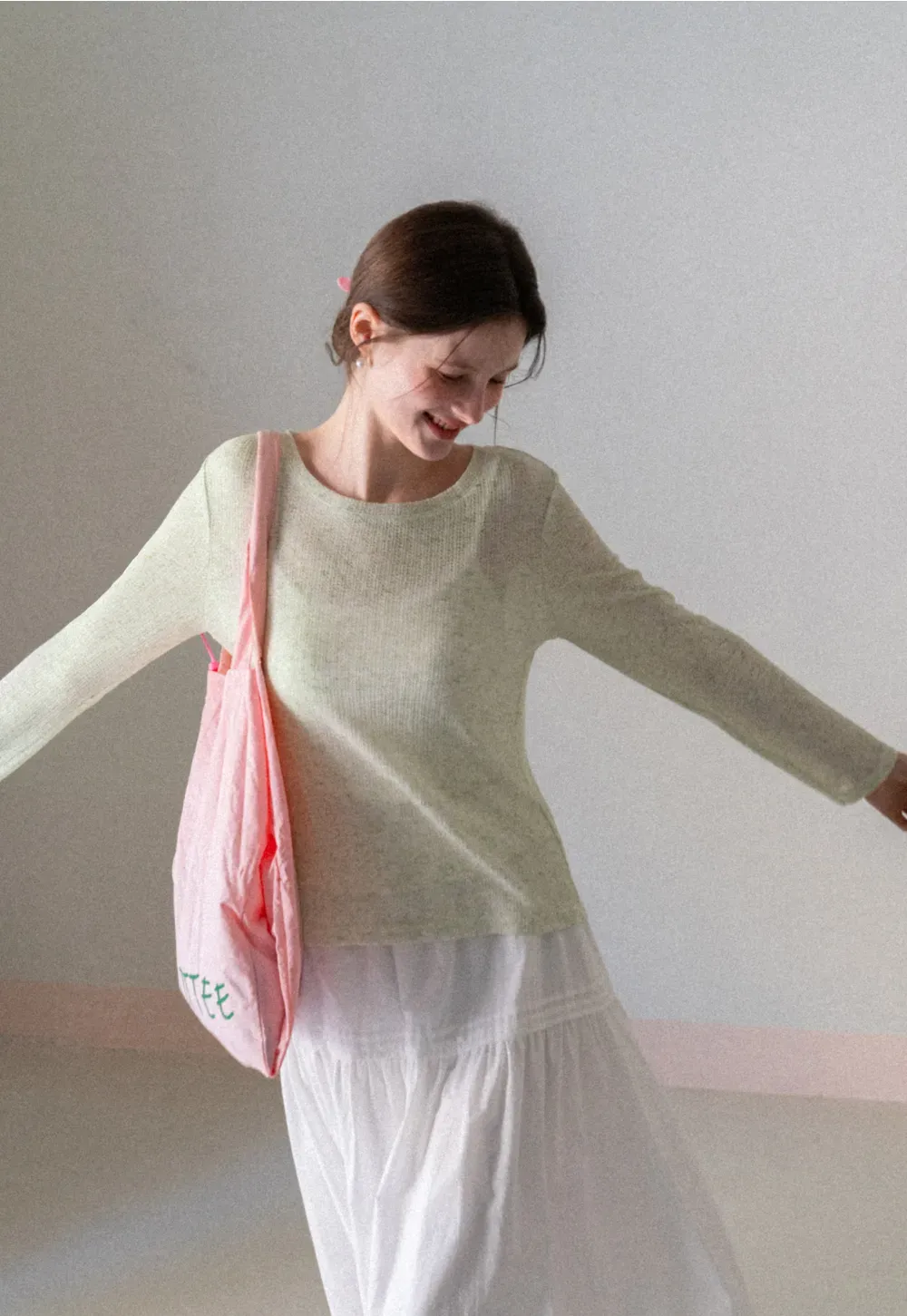 Long sleeve sheer knit top with round neckline