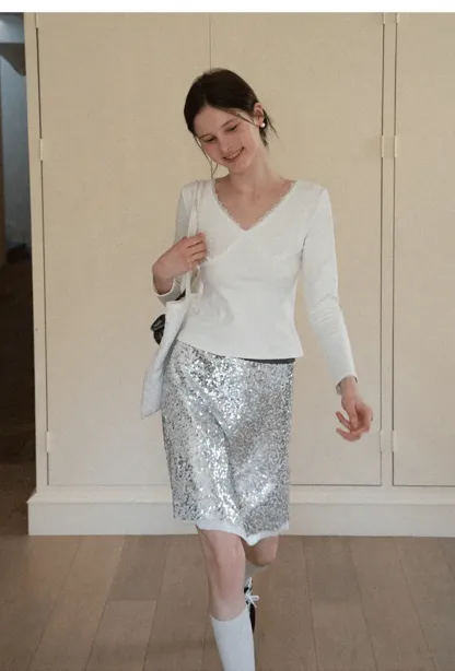 V neck long sleeve top with lace trim and fitted design