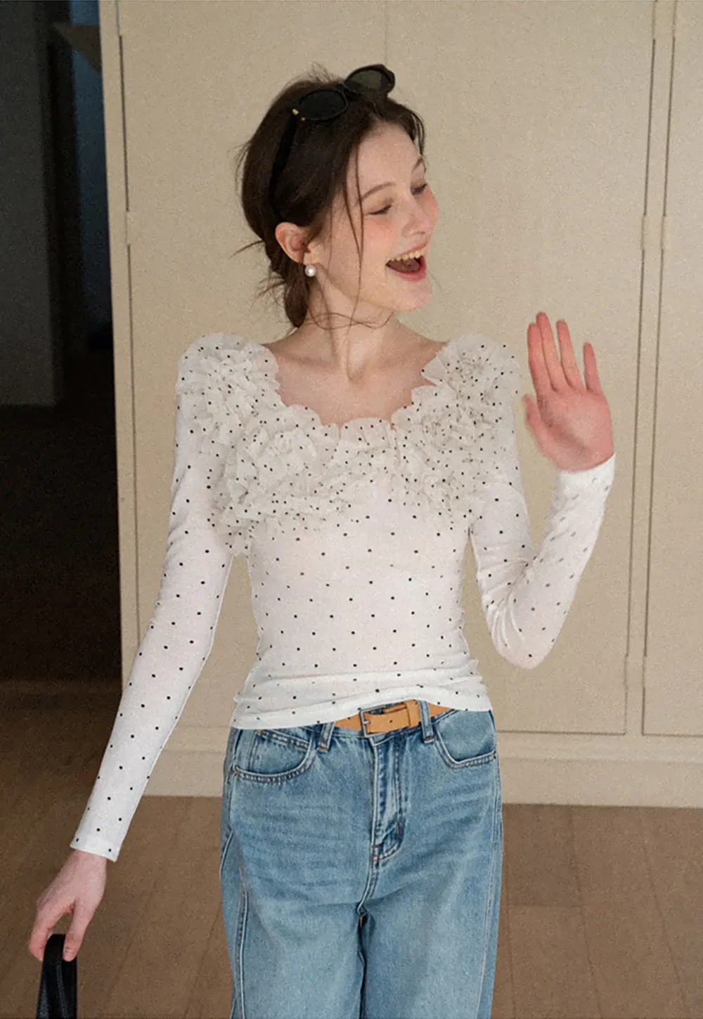 Polka dot long sleeve top with ruffled neckline