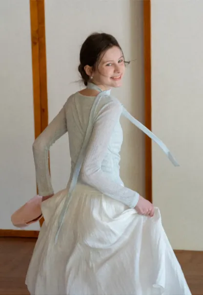 Long sleeve knit top with back tie detail