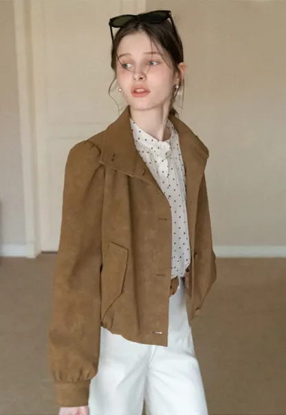 Elegant Blouse with Delicate Dot Pattern and Puffed Sleeves