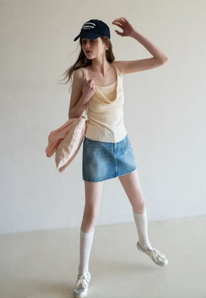 Silk-like tank top with thin straps and draped neckline