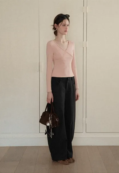 V neck long sleeve top with lace trim and fitted design