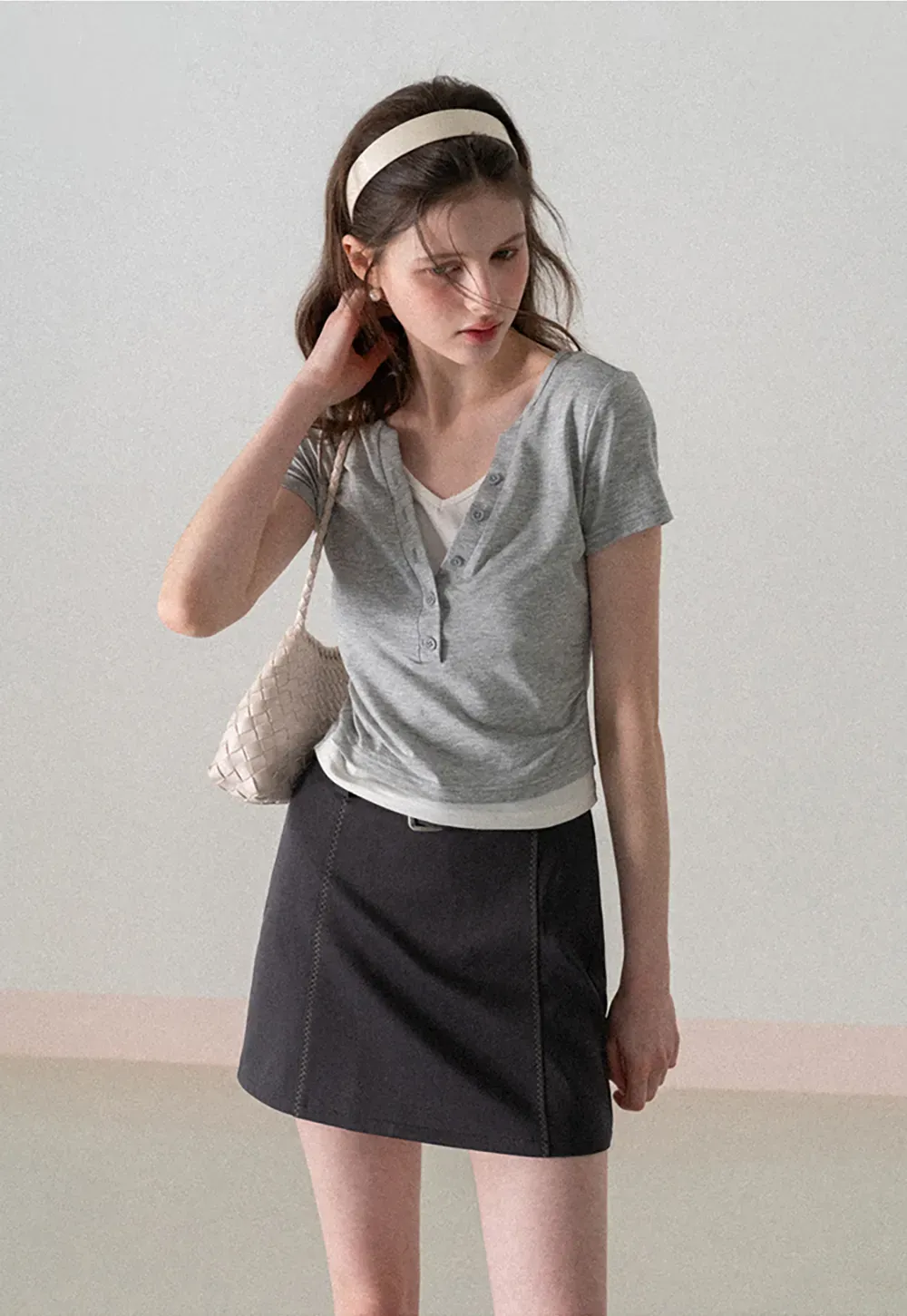 A-line mini skirt with contrast stitching and belt