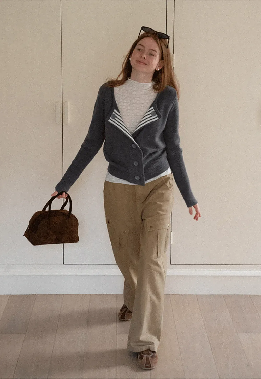 Elegant textured long sleeve top with subtle pattern design