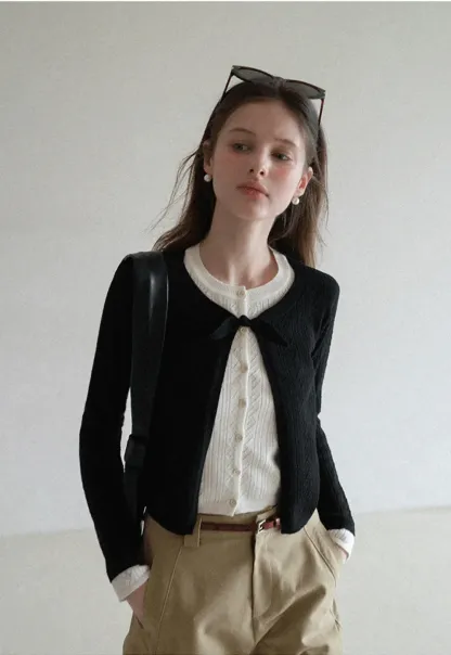 Elegant Knit Cardigan with Bow Detail and Ribbed Texture