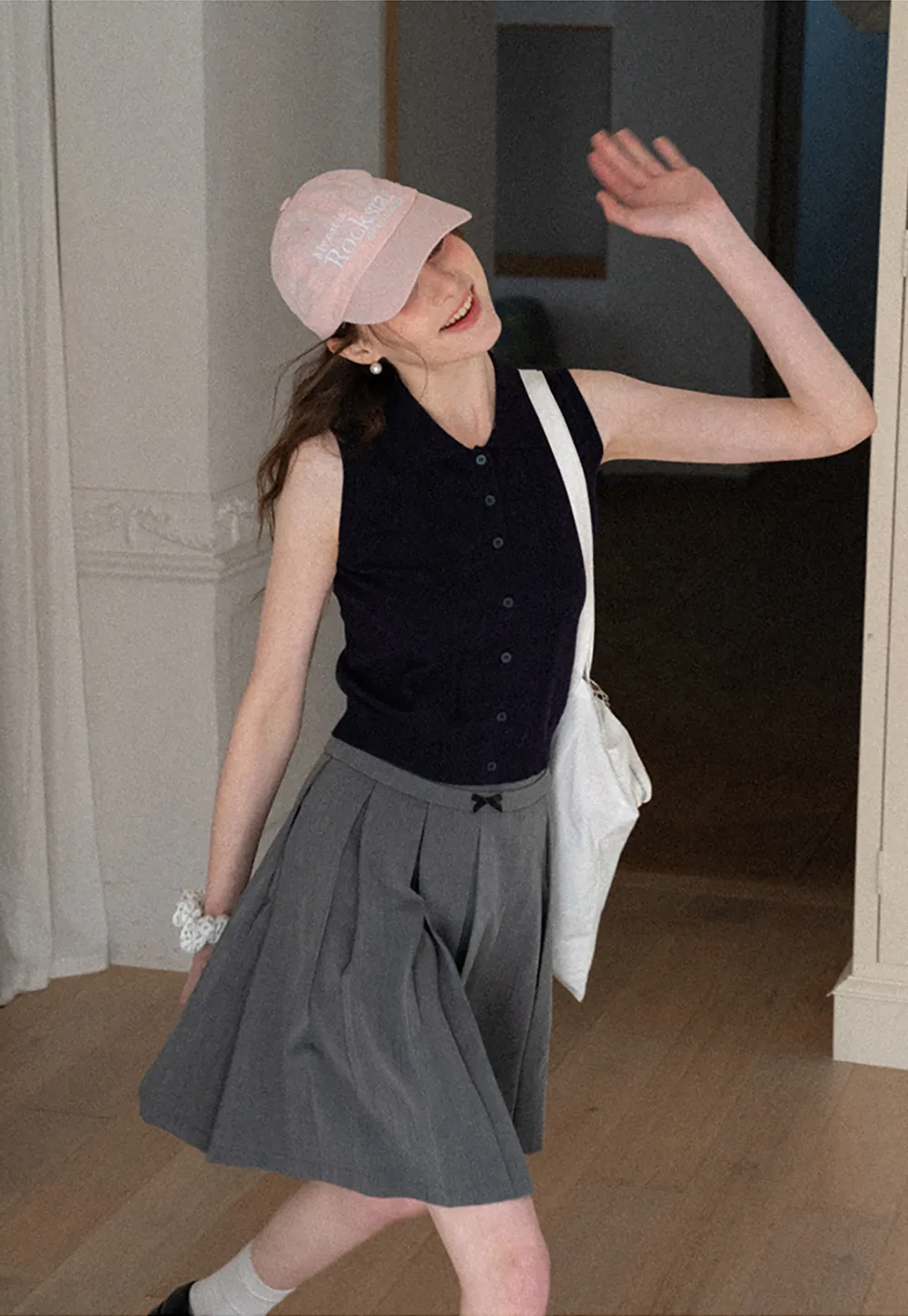 Sleeveless Knit Top with Collar and Buttons