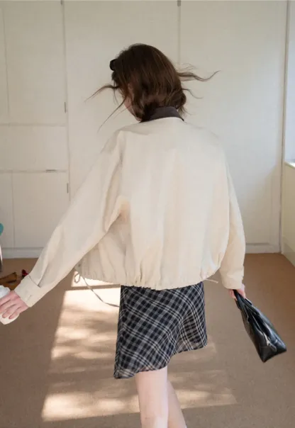 Short jacket with contrast collar and front buttons