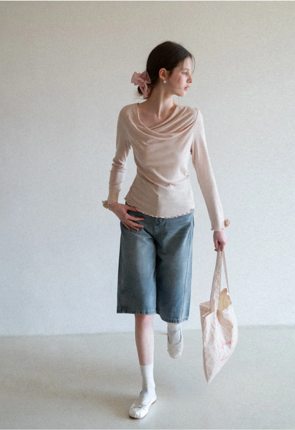 Long sleeve top with ruffled hem and cuffs