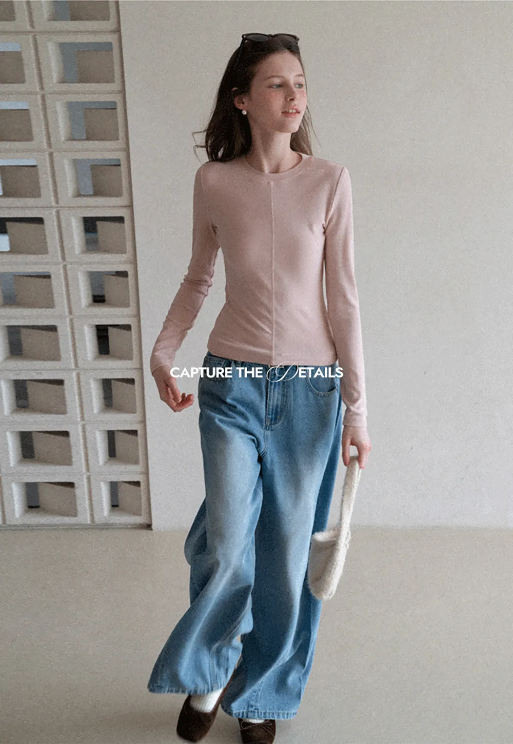 Long sleeve top with ruffled hem and layered design