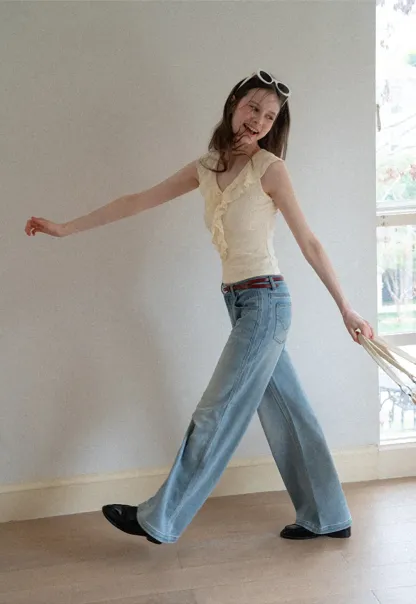 Sleeveless Top with Ruffled V Neck and Floral Detail