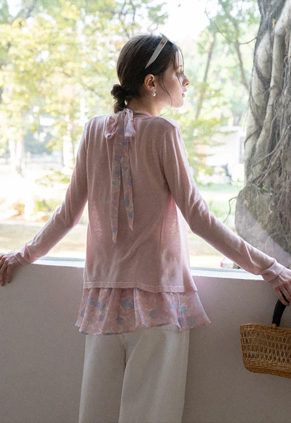 Woolen knit sweater with tie front and floral tank top