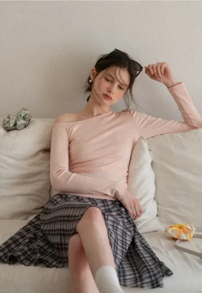 Asymmetrical long sleeve off shoulder top
