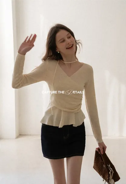 Long sleeve wrap knit sweater with ruched detail