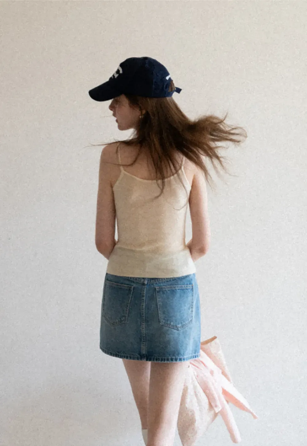 Silk-like tank top with thin straps and draped neckline