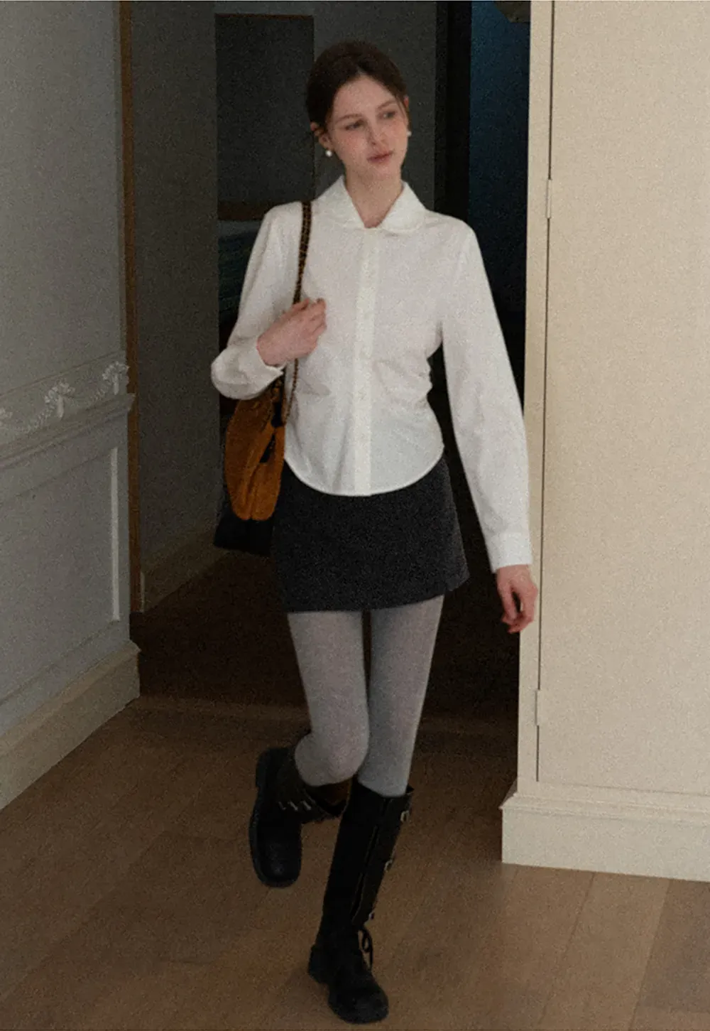 A-line mini skirt with textured fabric and central seam design