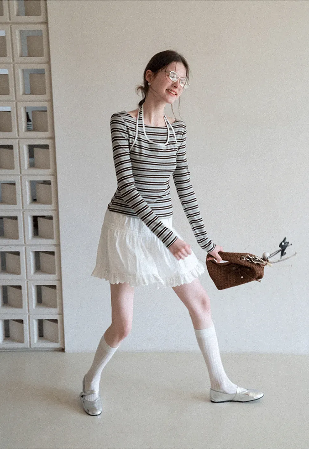 Long sleeve striped top with halter neck detail