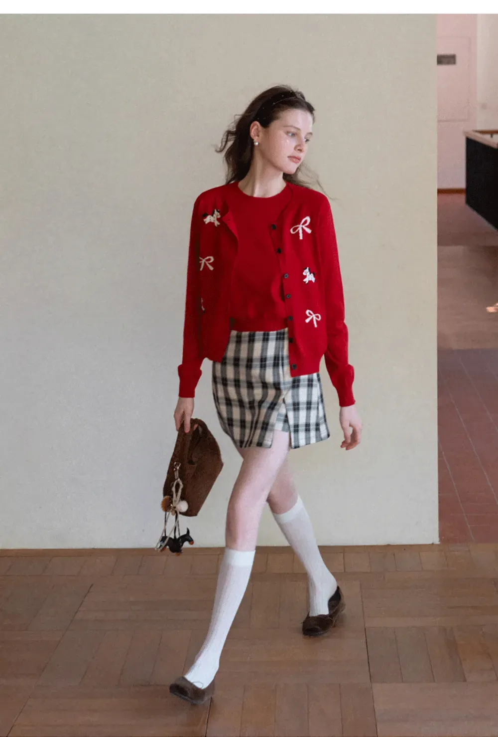 Woolen knit sweater with horse and bow motifs