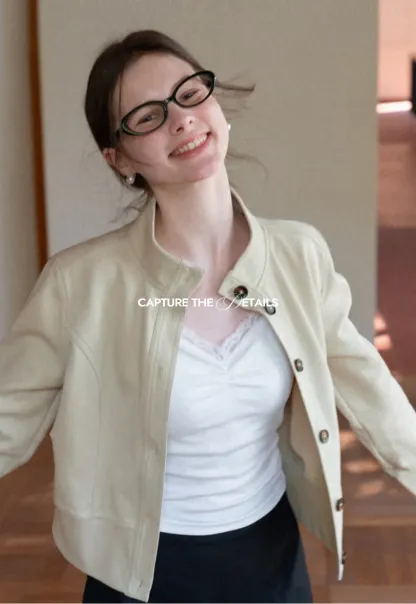 Short jacket with button front and ribbed cuffs