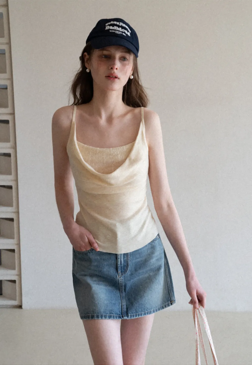 Silk-like tank top with thin straps and draped neckline