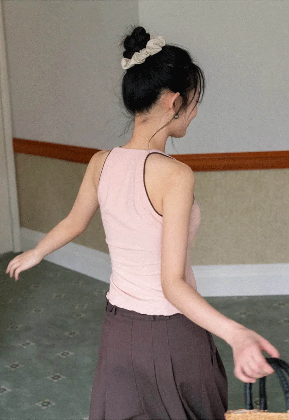 Halter neck tank top with thin straps and bow detail