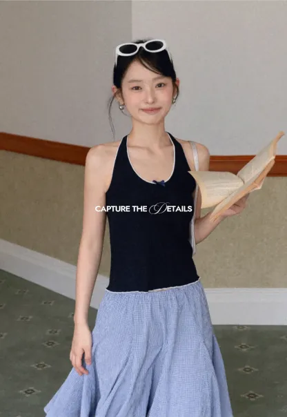 Halter neck tank top with thin straps and bow detail