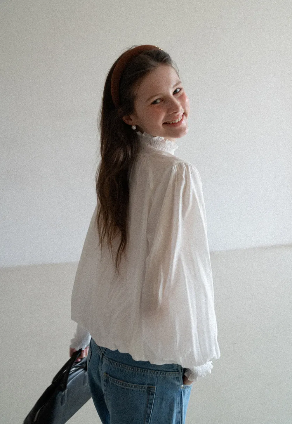 Elegant High Neck Blouse with Ruffled Cuffs and Hem