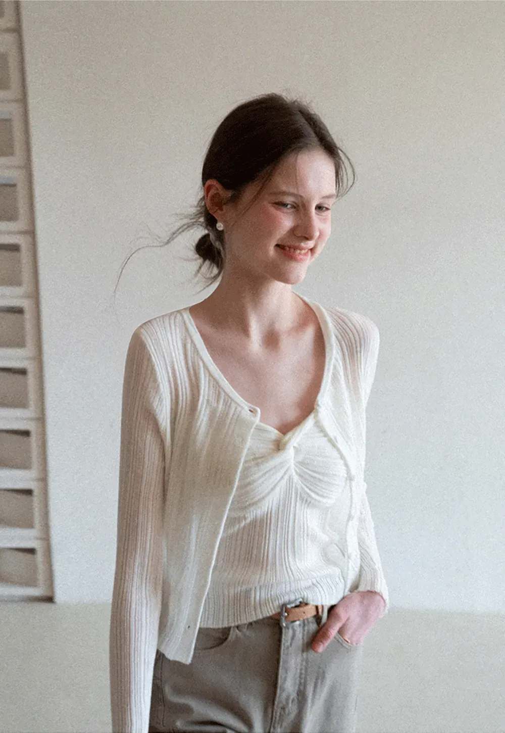 Ribbed knit sweater with V neckline and long sleeves