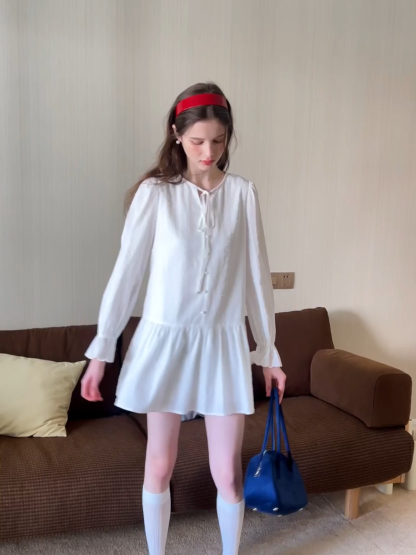 Elegant Long Sleeve Mini Dress with Flared Hem and Neck Tie