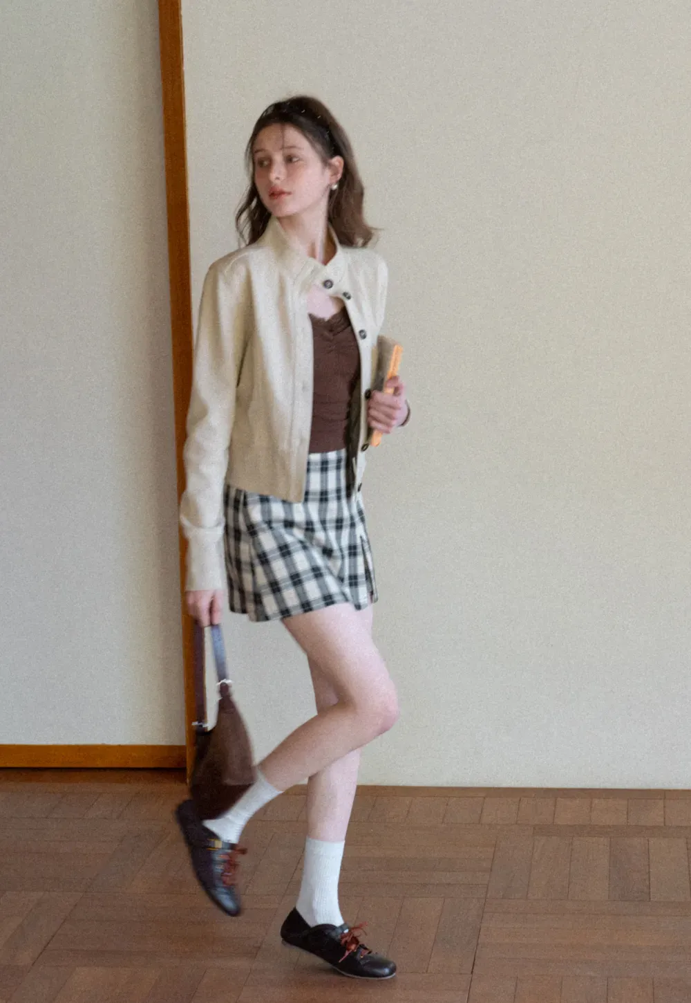Short jacket with button front and ribbed cuffs