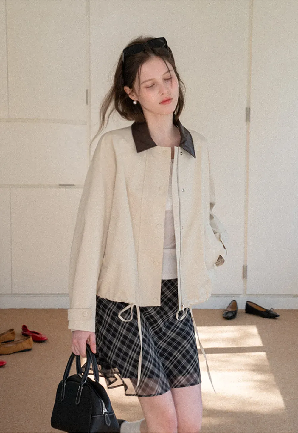 Short jacket with contrast collar and front buttons