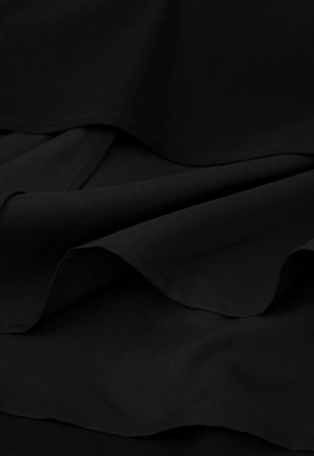 Sleeveless dress with back bow detail