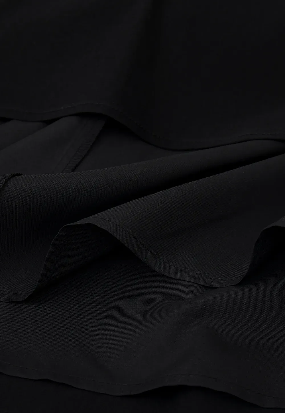 Sleeveless dress with back bow detail