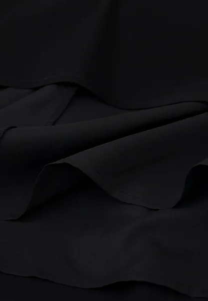 Sleeveless dress with back bow detail