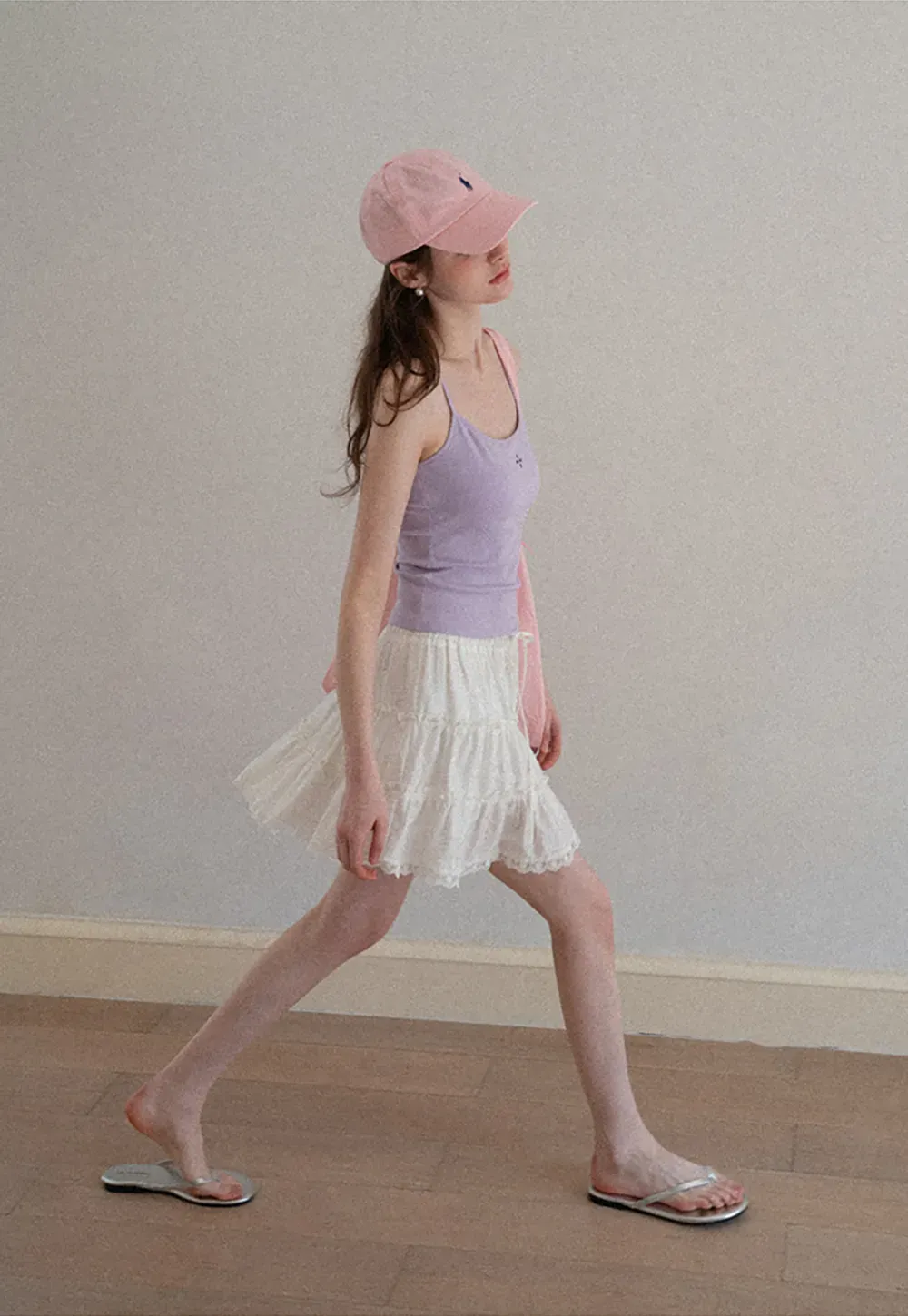 Gray tank top with small embroidered cross detail