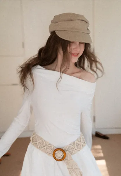 Elegant asymmetrical long sleeve dress with unique belt design