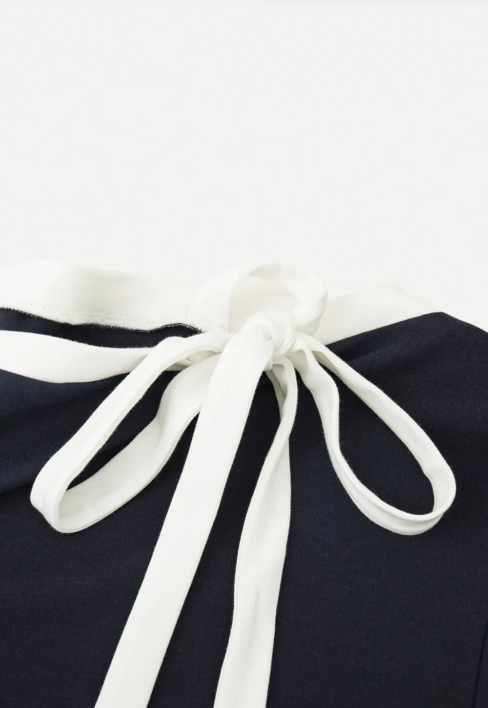 Long sleeve top with bow detail and mini skirt set