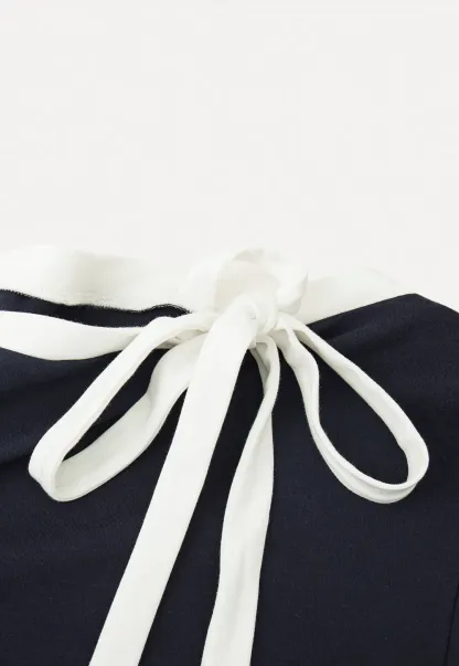 Long sleeve top with bow detail and mini skirt set