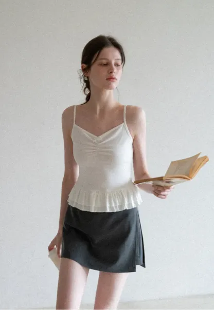 Elegant Pleated Mini Skirt with Asymmetrical Hem