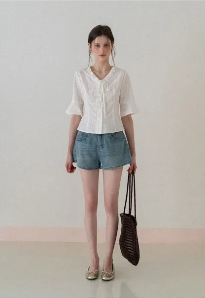 V neck blouse with lace trim and tie front