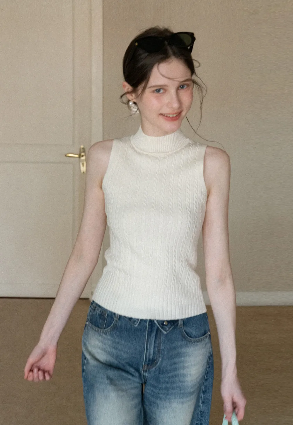 Cable Knit Sleeveless Top with High Neck Design