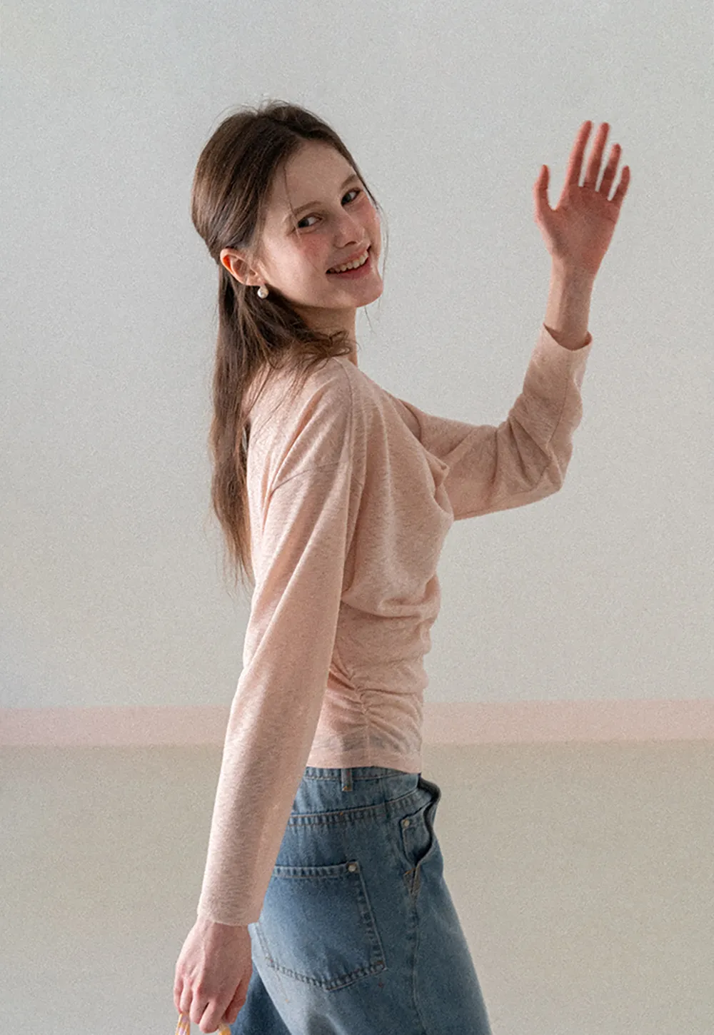 Long sleeve off shoulder draped knit top