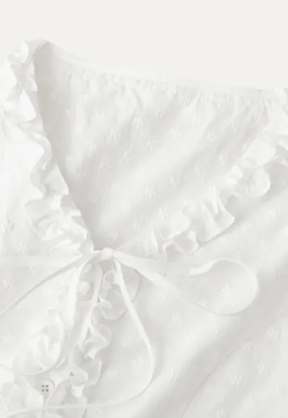 V neck blouse with lace trim and tie front